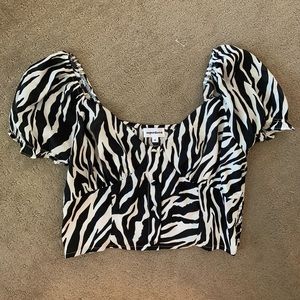 Super down zebra print top